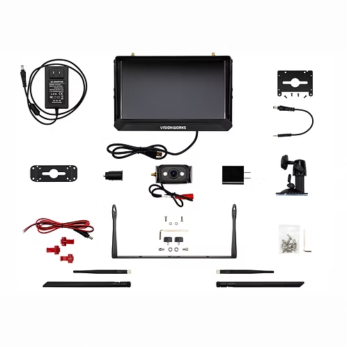 VisionWorks car dash camera kit laid out: 7-inch monitor, rear camera, mounting brackets, power adapters, cables, screws, and mounting plates.