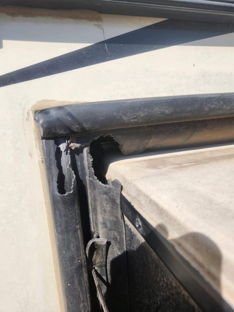 chewed slide out seal - California RV Specialists